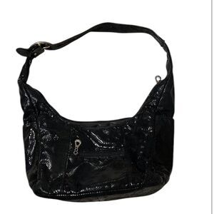 Fabulous preloved handbag 4 outside pockets adjustable strap 1 inside pocket GUC